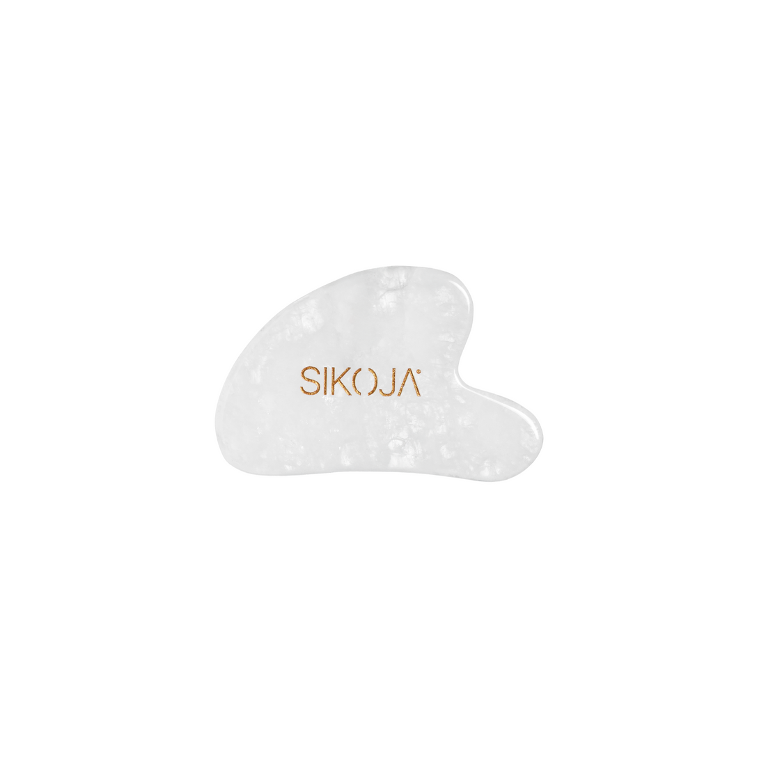 clear quartz gua sha against white background