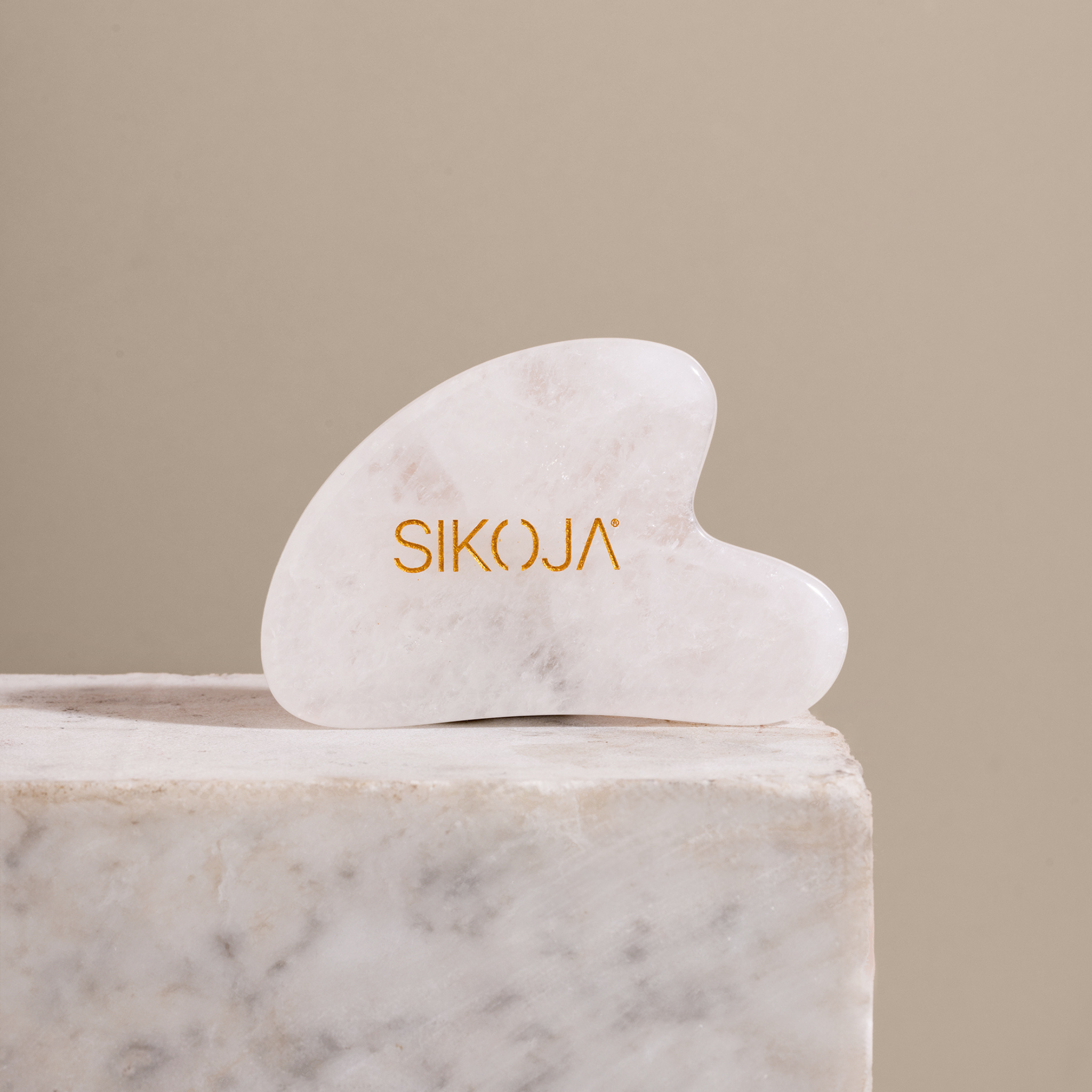 lifestyle shot of clear quartz gua sha